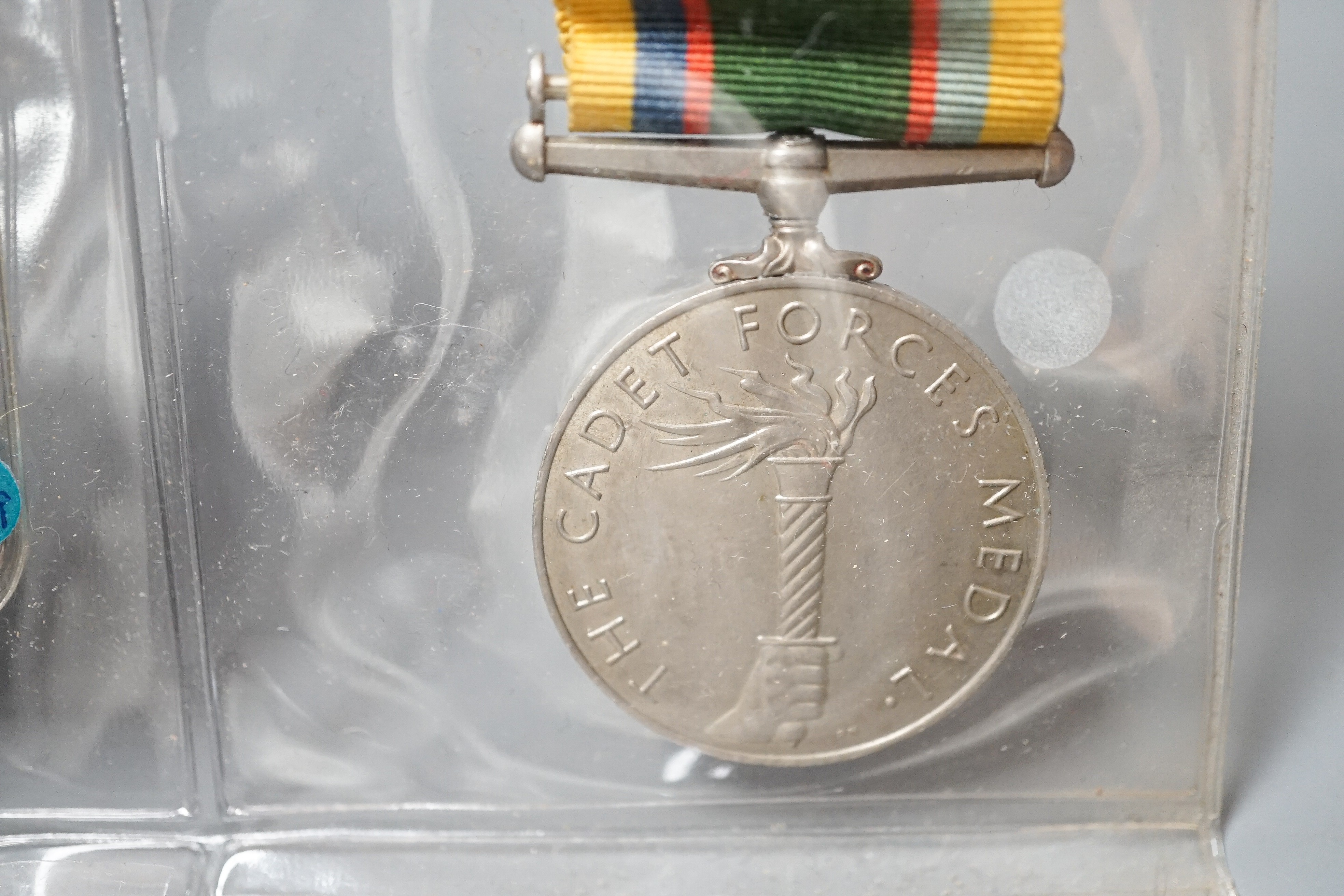 Four military medals - Korea medal to A. J. de Courcy Harrison, UN Korea medal, a George VI Cadet Forces medal and a GSM with Palestine clasp to 14158929 PTE. J. SANDERSON. A.C.C.